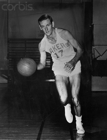 18 Jan 1951 --- Jim Pollard Dribbling a Basketball --- Image by © Bettmann/CORBIS